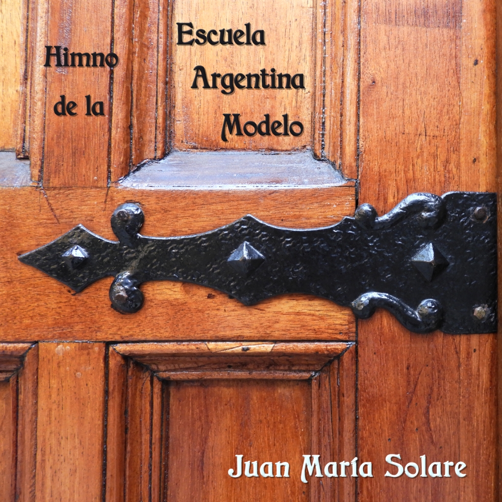 Portada del Himno de la Escuela Argentina Modelo (piano). Detalle del portón de la EAM. Foto: Enrique Martín Entenza.